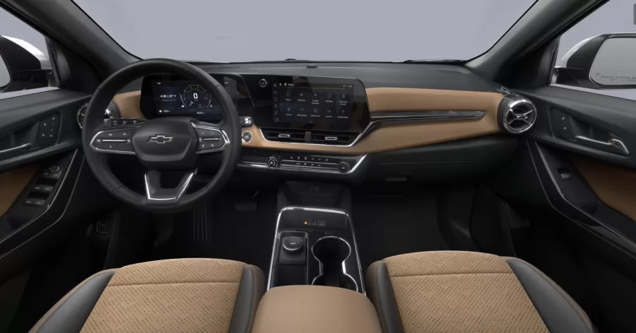 O interior do Equinox 2025 conta com telas digitais flutuantes para central multimídia e painel de instrumentos, oferecendo conectividade sem fio com Android Auto e Apple CarPlay, além de carregador por indução.