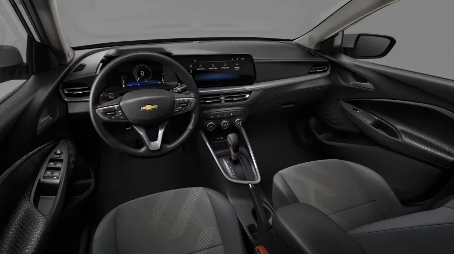 Equipado com câmbio automático de 6 marchas, o Chevrolet Onix LT 1.0 Turbo AT 2026 entrega conforto no trânsito e agilidade em retomadas, mantendo condução suave.