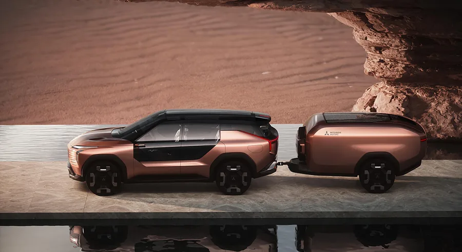 O SUV vem acompanhado por um trailer glamping que segue o mesmo design. Traz cama de casal, cozinha compacta e chuveiro, simbolizando a fusão entre tecnologia, aventura e estilo de vida.