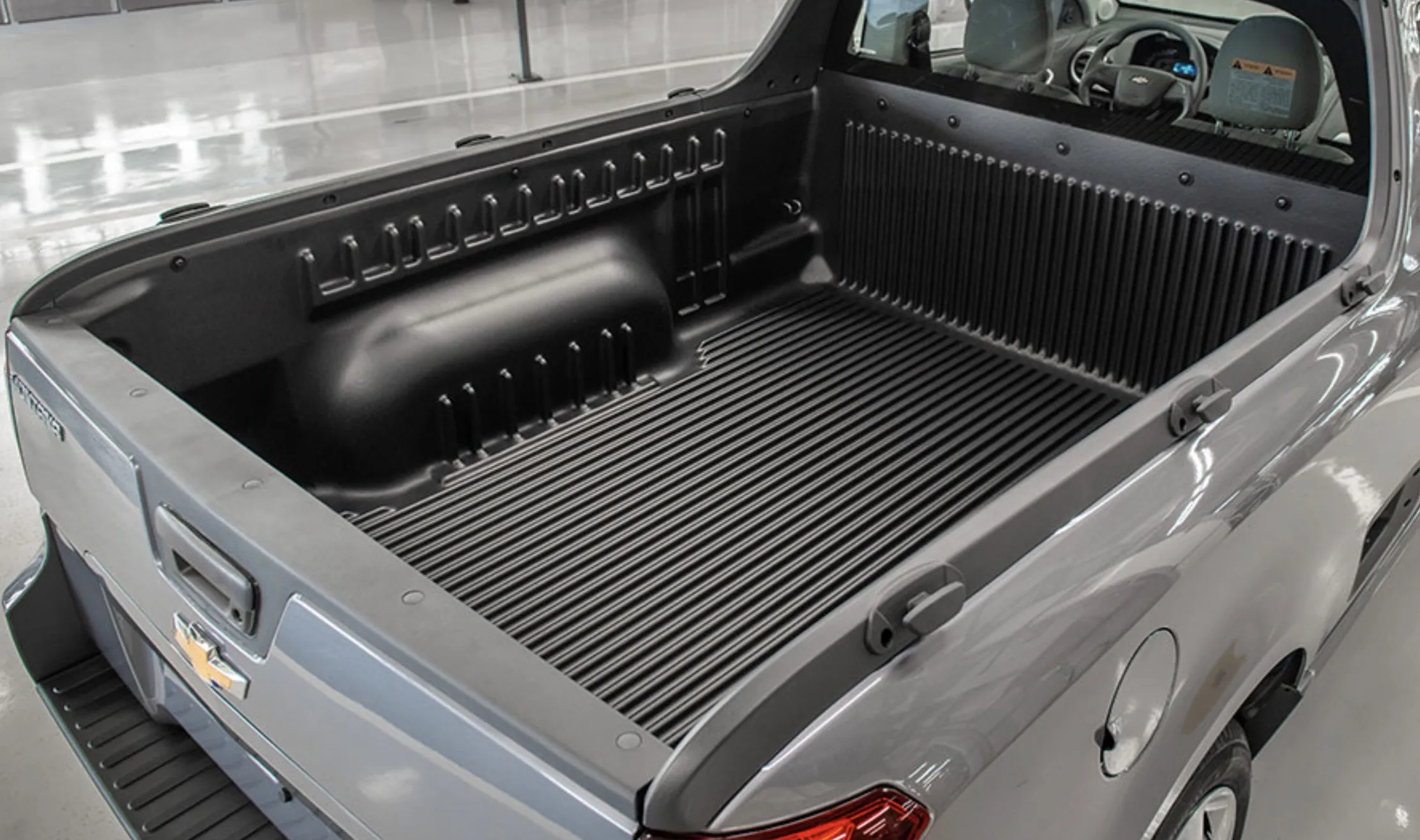 Chevrolet Montana de segunda geração usada combina caçamba de 1.100 litros, capacidade para 758 kg e manutenção simples, mas exige atenção à ignição, aos coxins e ao cabeçote