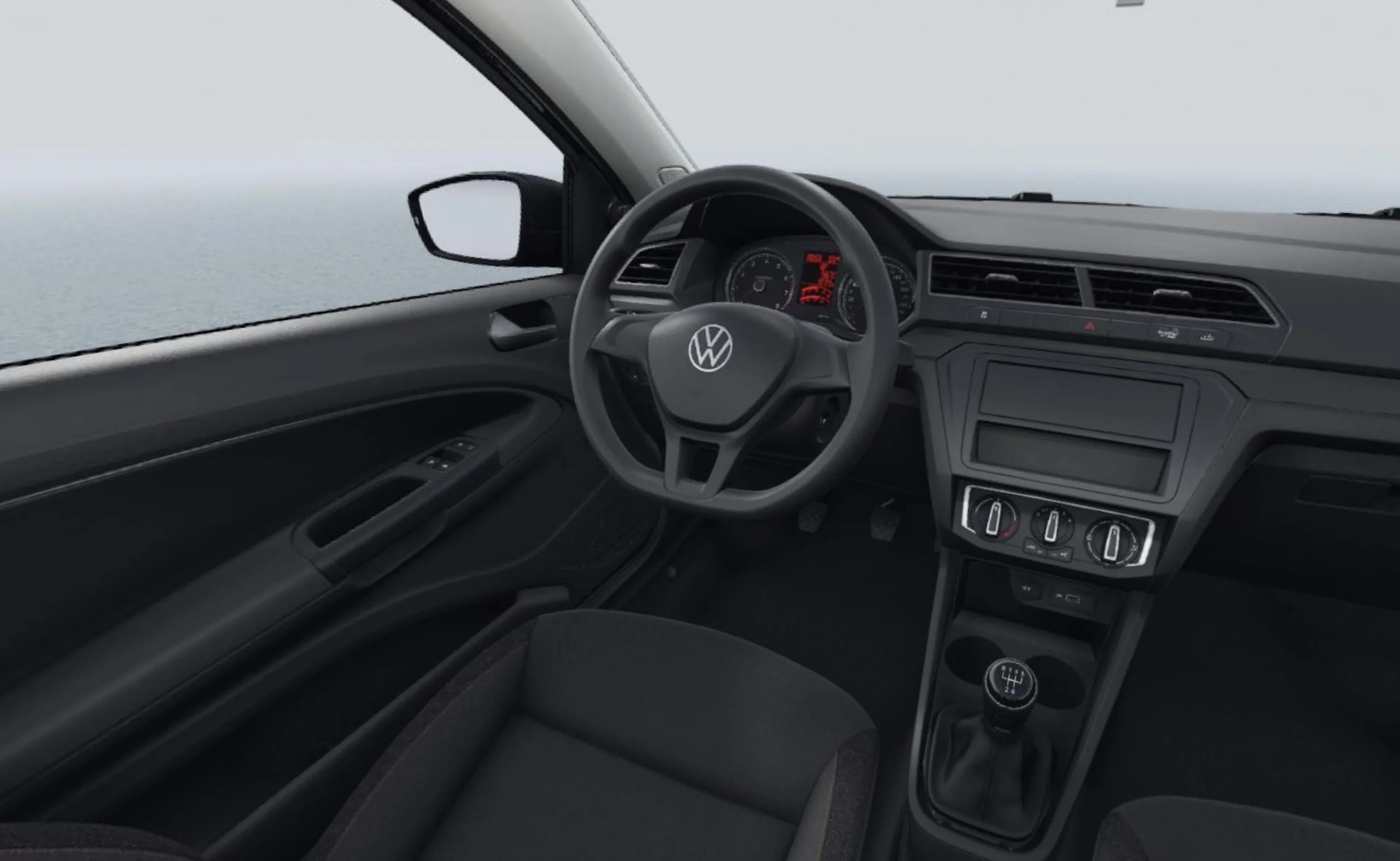 O interior da Volkswagen Saveiro Robust Etanol mantém a proposta de um carro de trabalho, com câmbio manual de cinco marchas e direção voltada ao uso frequente nas ruas e estradas.